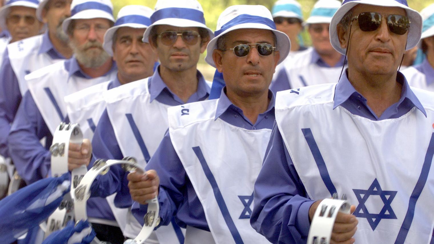 men-wearing-shirts-with-the-star-of-david-march-in-a-parade-injerusalem_5987922