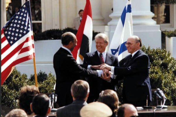 Carter_Sadat_and_Begin_at_the_Peace_Treaty_Signing_March_27_1979_10729561495